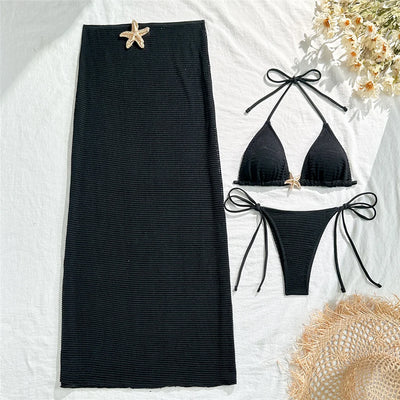 Ropa de playa con biquini y detalle de estrella