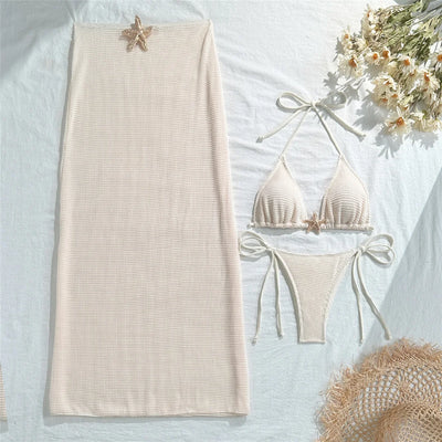 Ropa de playa con biquini y detalle de estrella