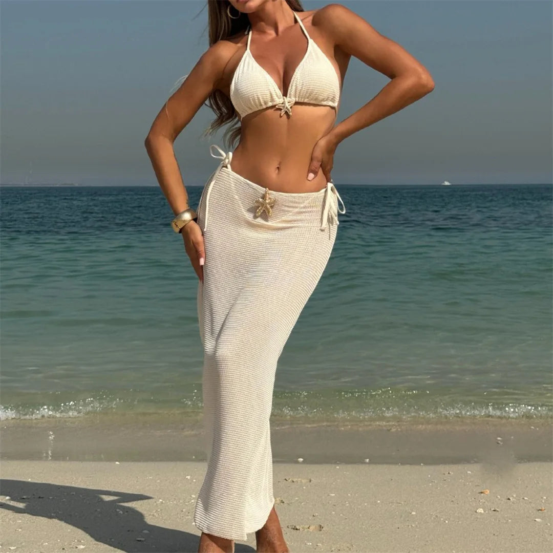 Ropa de playa con biquini y detalle de estrella