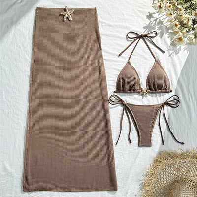 Ropa de playa con biquini y detalle de estrella