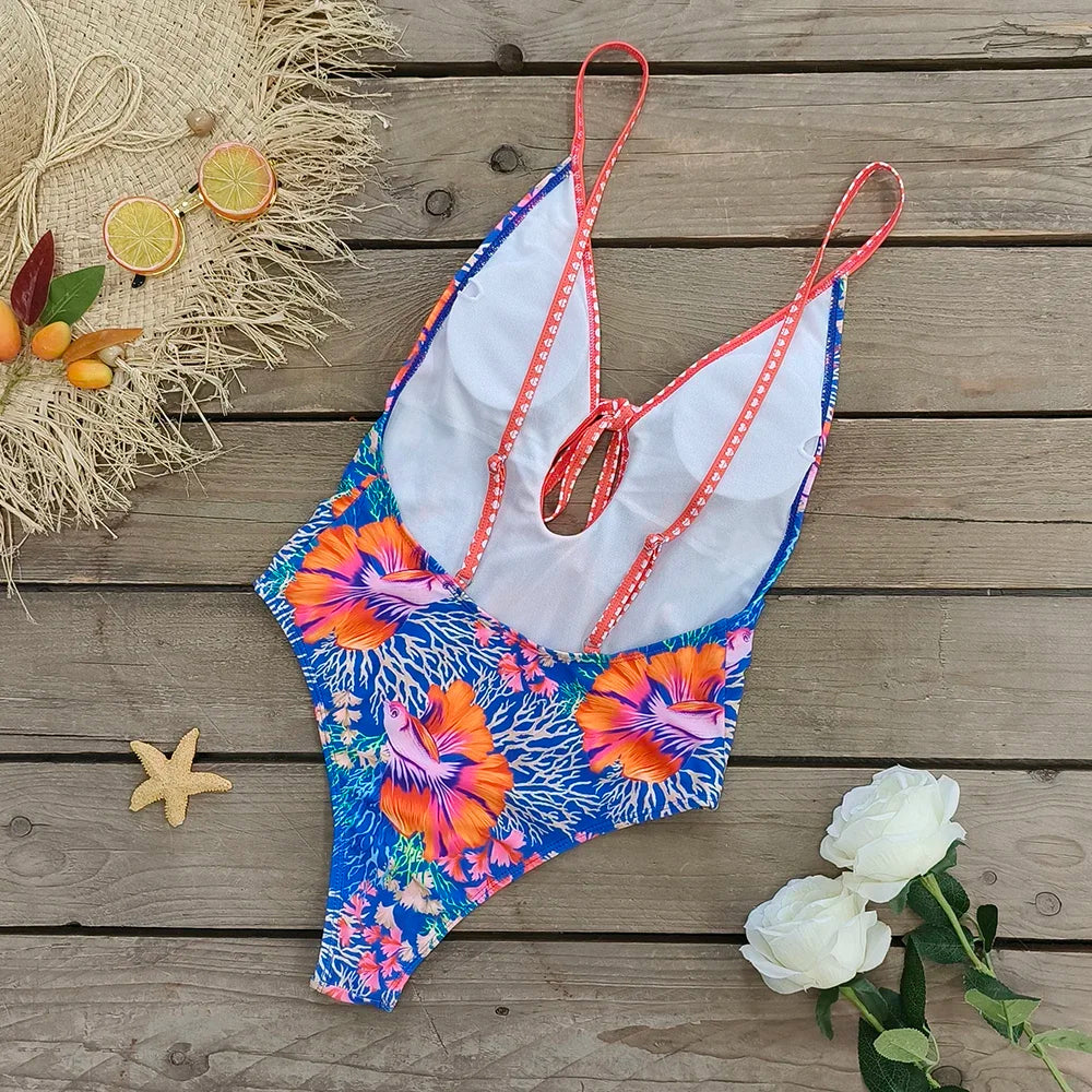 Bañador azul con estampado y espalda descubierta